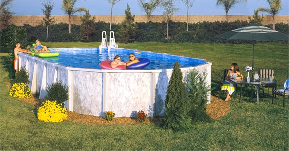 Above ground pool installation in a backyard